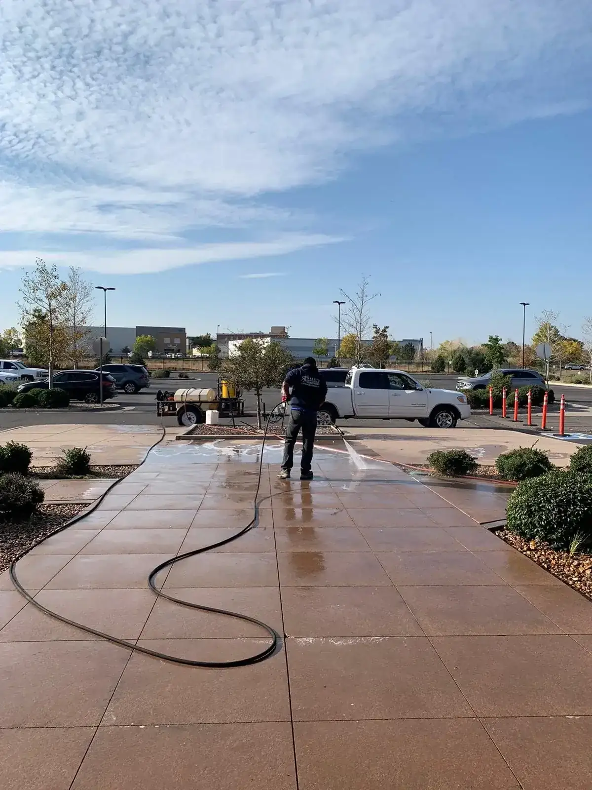Sample: commercial parking lot sidewalk pressure washing