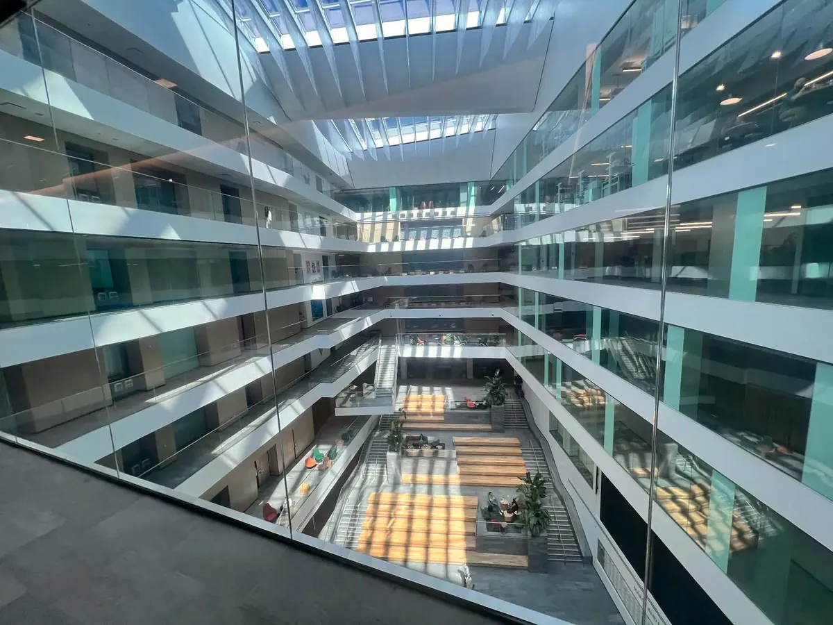 Sample of freshly cleaned glass in a multi-story office building atrium
